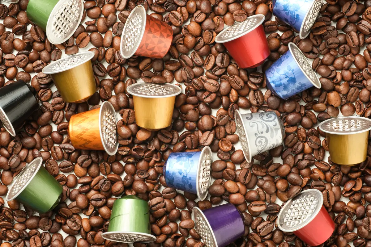multi colored coffee pods and coffee beans